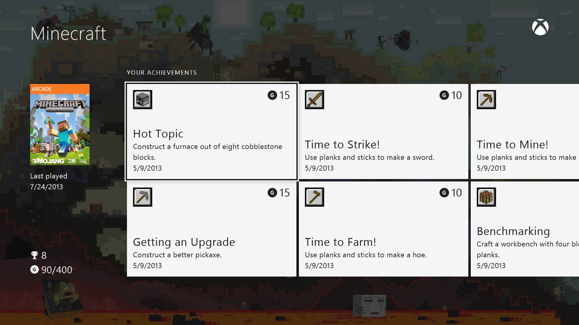 An image of the X-Box One unlocked achievement screen for the game Minecraft. The achievements appear as tiles in two rows that scroll horizontally off-screen.